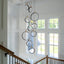 10-Ring LED Dimmable Geometric Chandelier, Black and Gold Foyer Light for High Ceilings with Remote & App Control